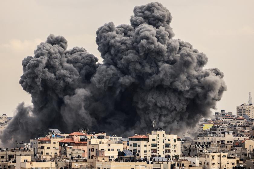 A plume of smoke rises in the sky of Gaza City during an Israeli airstrike on October 9, 2023. Israel relentlessly pounded the Gaza Strip overnight and into October 9 as fighting with Hamas continued around the Gaza Strip, as the death toll from the war against the Palestinian militants surged above 1,100. MAHMUD HAMS / AFP A plume of smoke rises in the sky of Gaza City during an Israeli airstrike on October 9, 2023. Israel relentlessly pounded the Gaza Strip overnight and into October 9 as fighting with Hamas continued around the Gaza Strip, as the death toll from the war against the Palestinian militants surged above 1,100. MAHMUD HAMS / AFP