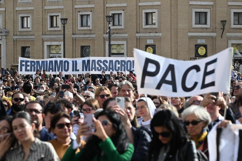 Faithful hold banners reading 'let's stop the massacre' and 'peace' as they gather Saint Peterâ€™s Square during Pope Francis' Angelus prayer at the Vatican, 05 November 2023. During the Angelus prayer, Pope Francis expresses his condolences for the victims of a deadly earthquake in Nepal, prayed for the victims of flooding in Europe and for Afghans who have taken refuge in neighboring Pakistan. EPA