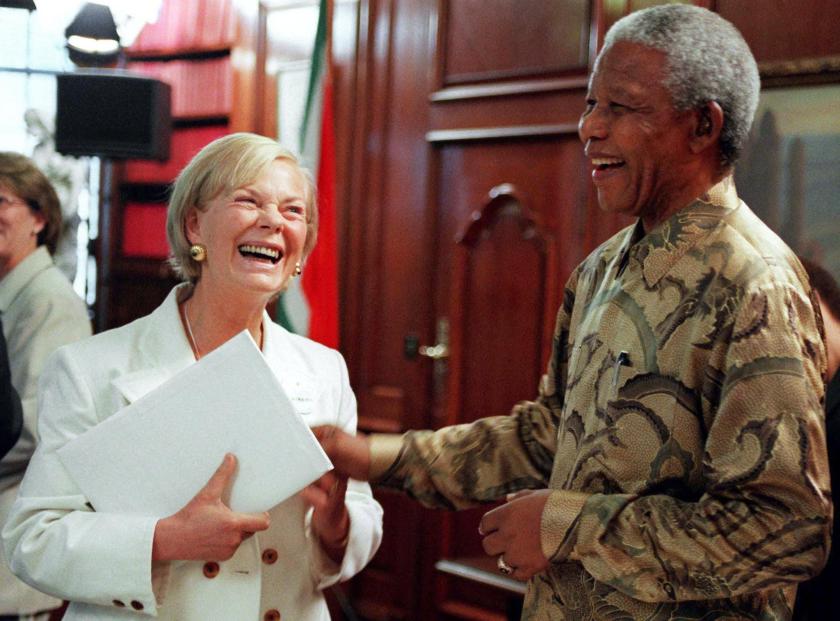 South African President Nelson Mandela (R) meets The Duchess Katharine of Kent upon her arrival at the South African High Commision in London 15 June. Mandela was hosting a fund-raising breakfast for the 'Nelson Mandela Children's Fund' which aims to help South African children who are homeless, without adequate education or in need of disaster relief. MICHAEL CRABTREE / POOL / AFP