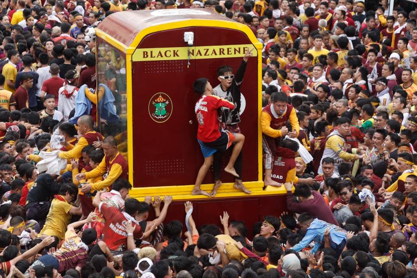 Catholic devotees participate in the procession marking the feast day of the Black Nazarene at the Quirino Grandstand park in Manila, Philippines, 09 January 2024. The Black Nazarene feast day honoring Jesus Christ is one of the first major celebrations for Catholics at the start of every year, and is highlighted by a whole day procession of barefoot devotees. EPA/ROLEX DELA PENA Catholic devotees participate in the procession marking the feast day of the Black Nazarene at the Quirino Grandstand park in Manila, Philippines, 09 January 2024. The Black Nazarene feast day honoring Jesus Christ is one of the first major celebrations for Catholics at the start of every year, and is highlighted by a whole day procession of barefoot devotees. EPA/ROLEX DELA PENA