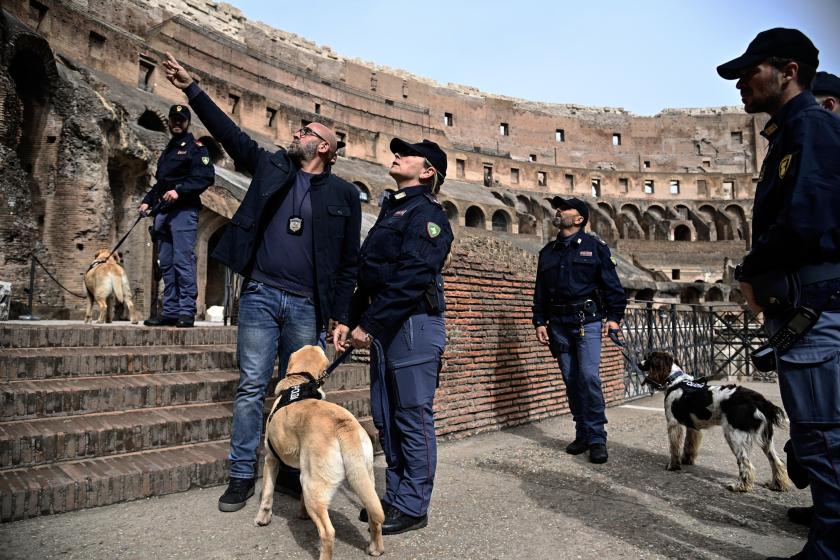 Canine unit police officers and dogs check for explosives inside the Colosseum prior to the Via Crucis procession led by the Pope, on Holy Friday in Rome, Italy, 29 March 2024. EPA/RICCARDO ANTIMIANI Canine unit police officers and dogs check for explosives inside the Colosseum prior to the Via Crucis procession led by the Pope, on Holy Friday in Rome, Italy, 29 March 2024. EPA/RICCARDO ANTIMIANI