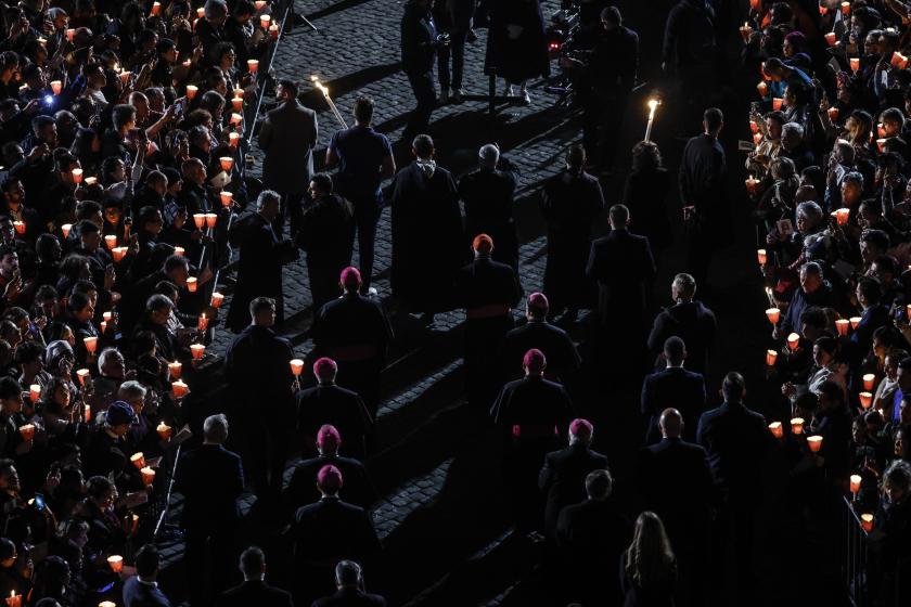 Faithful attend the 'Via Crucis', the 'Way of the Cross' torchlight procession, on Good Friday near the Colosseum in Rome, Italy, 29 March 2024. Good Friday is observed by Christians around the world to commemorate the crucifixion of Jesus Christ. 'To preserve his health in view of tomorrow's Vigil and the Holy Mass on Easter Sunday, this evening Pope Francis will follow the Via Crucis at Colosseum from Casa Santa Marta', as communicated by the Vatican Press Office. EPA/FABIO FRUSTACI