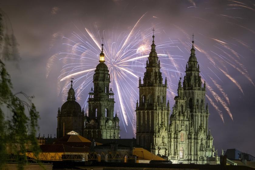Fireworks illuminates the night sky above the Santiago de Compostela Arch cathedral Basilica to start the celebrations for Saint James Day, to honor the patron saint of the city, in Santiago de Compostela, northwestern Spain, late 24 July 2024. St. James Day is marked annually on 25 July. EPA/XURXO MARTINEZ