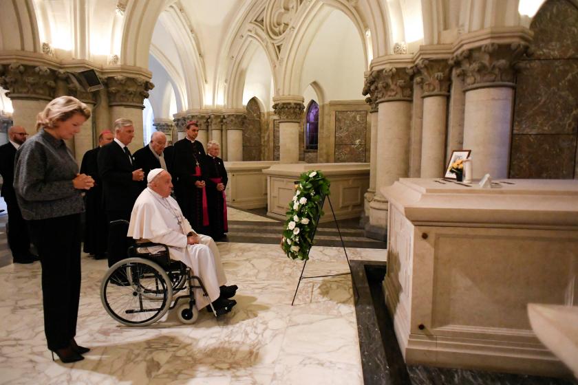 This handout photograph taken and released by the press service of the Vatican on September 28, 2024, shows Pope Francis (3rdL), Belgian King Philippe (2ndL) and Queen Mathilde (L) visiting the royal crypt, below the Church of Notre-Dame de Laeken, where the tombs of many members of the Royal House of Belgium are gathered, in Laeken. The pope is on a four-day apostolic journey to Luxembourg and Belgium. Handout / VATICAN MEDIA / AFP This handout photograph taken and released by the press service of the Vatican on September 28, 2024, shows Pope Francis (3rdL), Belgian King Philippe (2ndL) and Queen Mathilde (L) visiting the royal crypt, below the Church of Notre-Dame de Laeken, where the tombs of many members of the Royal House of Belgium are gathered, in Laeken. The pope is on a four-day apostolic journey to Luxembourg and Belgium. Handout / VATICAN MEDIA / AFP