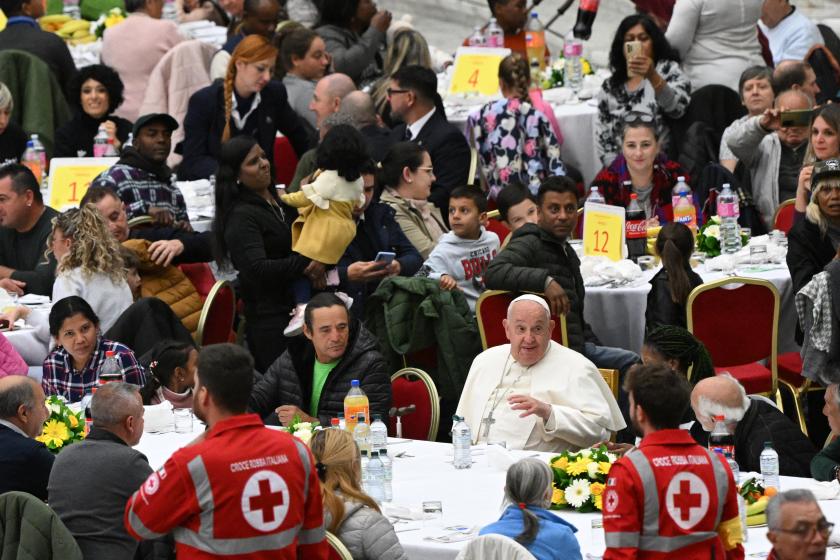 Pope Francis sits to share a lunch with people on the World Day of the Poor at the Paul VI audience hall in The Vatican, on November 17, 2024. Tiziana FABI / AFP Pope Francis sits to share a lunch with people on the World Day of the Poor at the Paul VI audience hall in The Vatican, on November 17, 2024. Tiziana FABI / AFP
