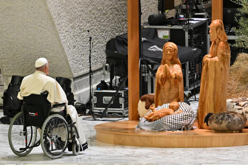 Pope Francis prays before the "Nativity of Bethlehem 2024" during its inauguration in the Paul VI Hall, during the private audience to donors of the Nativity Scene and the lighting of the Christmas tree ceremony at St Peter’s Square in the Paul-VI hall at the Vatican on December 7, 2024. Andreas SOLARO / AFP Pope Francis prays before the "Nativity of Bethlehem 2024" during its inauguration in the Paul VI Hall, during the private audience to donors of the Nativity Scene and the lighting of the Christmas tree ceremony at St Peter’s Square in the Paul-VI hall at the Vatican on December 7, 2024. Andreas SOLARO / AFP