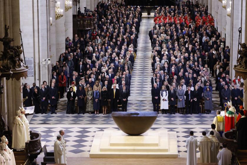 Guests stand during a ceremony to mark the re-opening of the landmark Notre-Dame Cathedral, in central Paris, on December 7, 2024. Around 50 heads of state and government are expected in the French capital to attend the ceremony marking the rebuilding of the Gothic masterpiece five years after the 2019 fire which ravaged the world heritage landmark and toppled its spire. Some 250 companies and hundreds of experts were part of the five-year restoration project at a cost of hundreds of millions of euros. Ludovic MARIN / POOL / AFP Guests stand during a ceremony to mark the re-opening of the landmark Notre-Dame Cathedral, in central Paris, on December 7, 2024. Around 50 heads of state and government are expected in the French capital to attend the ceremony marking the rebuilding of the Gothic masterpiece five years after the 2019 fire which ravaged the world heritage landmark and toppled its spire. Some 250 companies and hundreds of experts were part of the five-year restoration project at a cost of hundreds of millions of euros. Ludo