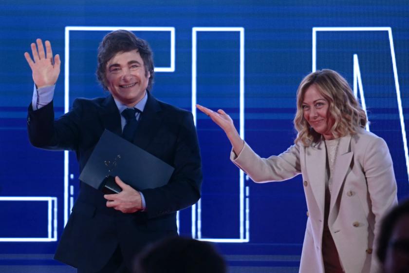 Argentina's President Javier Milei waves from the stage next to Italy's Prime Minister Giorgia Meloni during the Atreju political meeting organised by the young militants of Italian right wing party Brothers of Italy (Fratelli d'Italia) on December 14, 2024 in Rome. Filippo MONTEFORTE / AFP Argentina's President Javier Milei waves from the stage next to Italy's Prime Minister Giorgia Meloni during the Atreju political meeting organised by the young militants of Italian right wing party Brothers of Italy (Fratelli d'Italia) on December 14, 2024 in Rome. Filippo MONTEFORTE / AFP