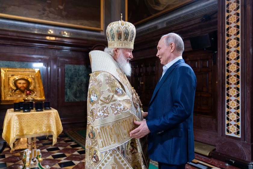 This handout photograph taken and released by Russian Orthodox Church Press Service on January 7, 2025 shows Russia's President Vladimir Putin (R) and Russia's Orthodox Patriarch Kirill (L) attending an Orthodox Christmas Service at the Christ the Saviour cathedral in Moscow. Oleg Varov / Russian Orthodox Church Press Service / AFP