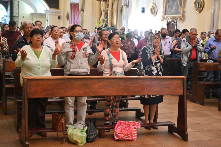 Catholic faithful pray during a mass for the healing of Pope Francis at San Miguel Arcangel Cathedral in Tegucigalpa on February 23, 2025. Pope Francis's ninth night in hospital passed peacefully after a respiratory attack that sparked alarm, the Vatican said Sunday, although the 88-year-old is still using oxygen through a tube to the nostrils. Orlando SIERRA / AFP Catholic faithful pray during a mass for the healing of Pope Francis at San Miguel Arcangel Cathedral in Tegucigalpa on February 23, 2025. Pope Francis's ninth night in hospital passed peacefully after a respiratory attack that sparked alarm, the Vatican said Sunday, although the 88-year-old is still using oxygen through a tube to the nostrils. Orlando SIERRA / AFP