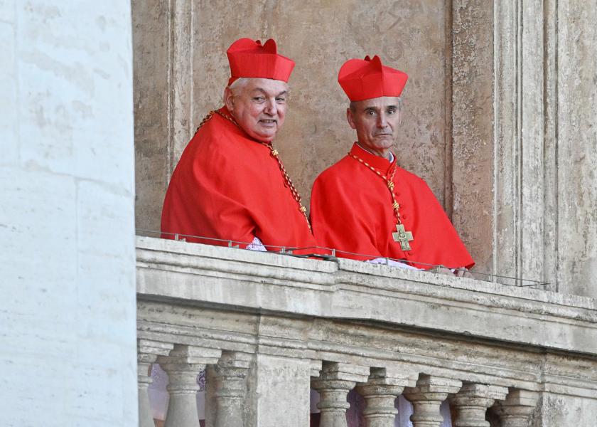 French cardinals Jean-Marc Aveline (L) and Jean-Paul Vesco react from a balcony after the newly elected pope addressed the crowd at the St Peter's Basilica for the first time, in The Vatican, on May 8, 2025. Robert Francis Prevost was on Thursday elected the first pope from the United States, the Vatican announced. A moderate who was close to Pope Francis and spent years as a missionary in Peru, he becomes the Catholic Church's 267th pontiff, taking the papal name Leo XIV. French cardinals Jean-Marc Aveline (L) and Jean-Paul Vesco react from a balcony after the newly elected pope addressed the crowd at the St Peter's Basilica for the first time, in The Vatican, on May 8, 2025. Robert Francis Prevost was on Thursday elected the first pope from the United States, the Vatican announced. A moderate who was close to Pope Francis and spent years as a missionary in Peru, he becomes the Catholic Church's 267th pontiff, taking the papal name Leo XIV.