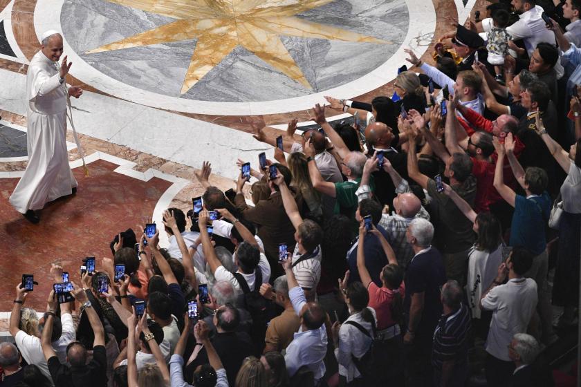 A handout picture provided by the Vatican Media shows Pope Leo XIV (L) waving to participants during the Jubilee Audience at the Saint Peter's Basilica, in Vatican City, 14 June 2025. A handout picture provided by the Vatican Media shows Pope Leo XIV (L) waving to participants during the Jubilee Audience at the Saint Peter's Basilica, in Vatican City, 14 June 2025.