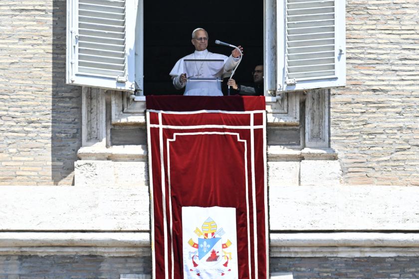Pope Leo XIV sets the microphone as he appears at the window of the apostolic palace overlooking St. Peter's square to leads the Angelus prayer in the Vatican on July 6, 2025. Andreas SOLARO / AFP Pope Leo XIV sets the microphone as he appears at the window of the apostolic palace overlooking St. Peter's square to leads the Angelus prayer in the Vatican on July 6, 2025. Andreas SOLARO / AFP