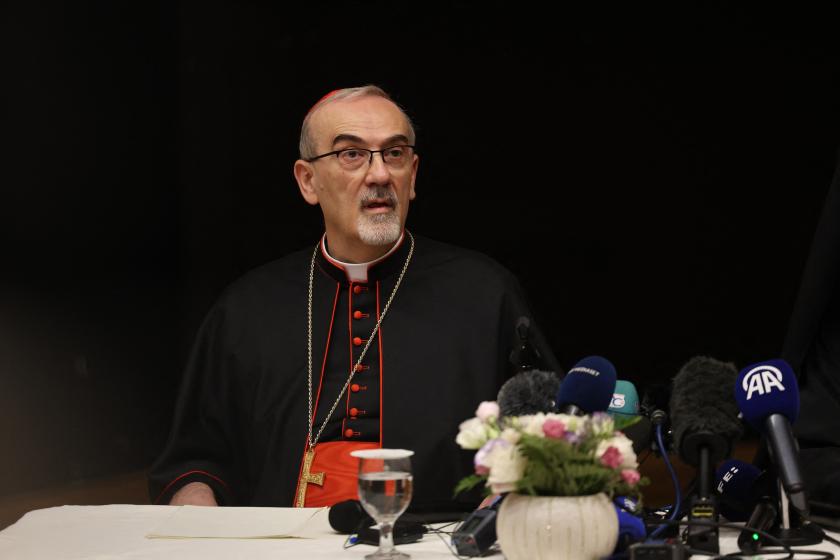 Latin Patriarch of Jerusalem Pierbattista Pizzaballa speaks during a joint press conference with Greek Orthodox Patriarch of Jerusalem Theophilos III (not pictured) in Jerusalem on July 22, 2025. Pizzaballa, the Roman Catholic church's most senior cleric in the Holy Land said "we have seen men holding out in the sun for hours in the hope of a simple meal," adding "it's morally unacceptable and unjustified", during a news conference after visiting the Israel-besieged Palestinian territory. Ahmad GHARABLI / A