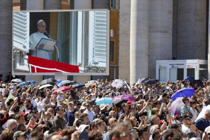 Pope Leo XIV appears on a screen as he leads the Angelus prayer from the window of his office overlooking Saint Peter's Square, in Vatican City, 31 August 2025. EPA/FABIO FRUSTACI