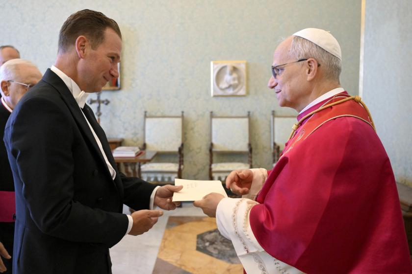 A handout picture provided by the Vatican Media shows Pope Leo XIV (R) receiving in audience the Ambassador of the United States of America to the Holy See, Brian Francis Burch II, on the occasion of the presentation of his Letters of Credence, Vatican City, 13 September 2025.