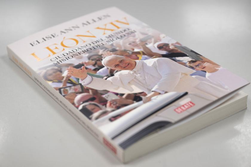 The book "Pope Leo XIV: Global Citizen, Missionary of the 21st Century" by US journalist Elise Ann Allen is seen on a table in Lima on September 16, 2025. Pope Leo XIV sought to reassure Catholics in his first interview published Thursday that he would not change key doctrine on gay marriage and women deacons, after his predecessor's divisive papacy. The US-born pontiff, elected four months ago, struck a different tone to outspoken Pope Francis, whose attempts to open the Church for the modern era enraged t