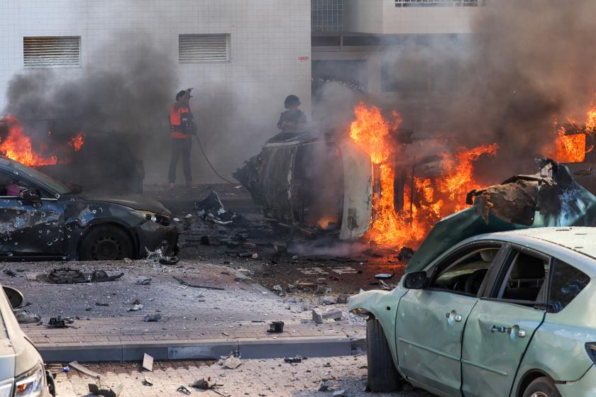 People try to extinguish fire on cars following a rocket attack from the Gaza Strip in Ashkelon, southern Israel, on October 7, 2023. Palestinian militant group Hamas has launched a "war" against Israel, Defence Minister Yoav Gallant said, after barrages of rockets were fired from the Gaza Strip into Israeli territory on October 7.
AHMAD GHARABLI / AFP People try to extinguish fire on cars following a rocket attack from the Gaza Strip in Ashkelon, southern Israel, on October 7, 2023. Palestinian militant group Hamas has launched a "war" against Israel, Defence Minister Yoav Gallant said, after barrages of rockets were fired from the Gaza Strip into Israeli territory on October 7.
AHMAD GHARABLI / AFP
