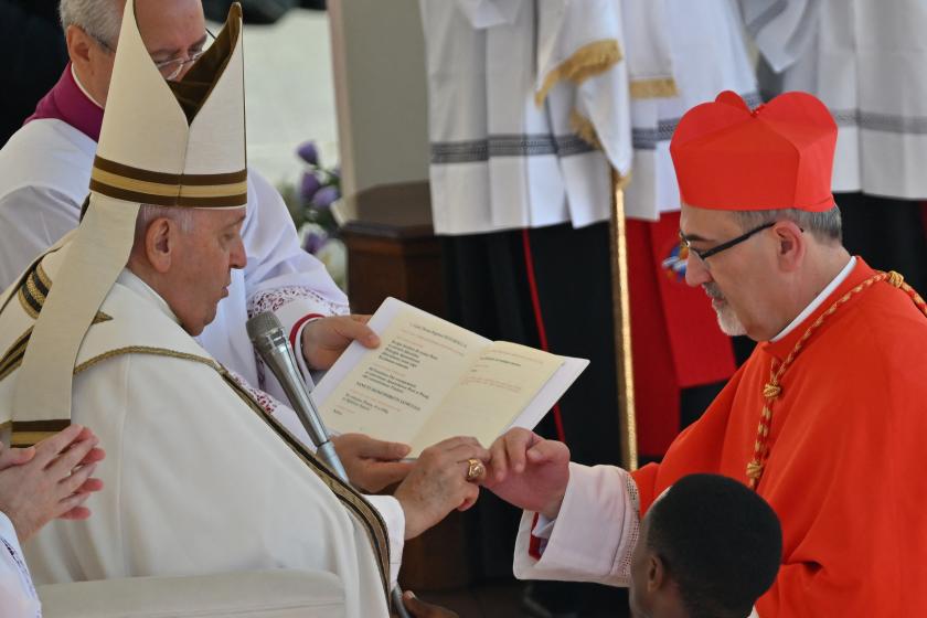 Italian Latin Patriarch of Jerusalem Pierbattista Pizzaballa (R) is elevated cardinal by Pope Francis during a consistory to create 21 new cardinals at St. Peter's square in The Vatican on September 30, 2023. Pope Francis elevates 21 clergymen from all corners of the world to the rank of cardinal -- most of whom may one day cast ballots to elect his successor. Filippo MONTEFORTE / AFP Italian Latin Patriarch of Jerusalem Pierbattista Pizzaballa (R) is elevated cardinal by Pope Francis during a consistory to create 21 new cardinals at St. Peter's square in The Vatican on September 30, 2023. Pope Francis elevates 21 clergymen from all corners of the world to the rank of cardinal -- most of whom may one day cast ballots to elect his successor. Filippo MONTEFORTE / AFP