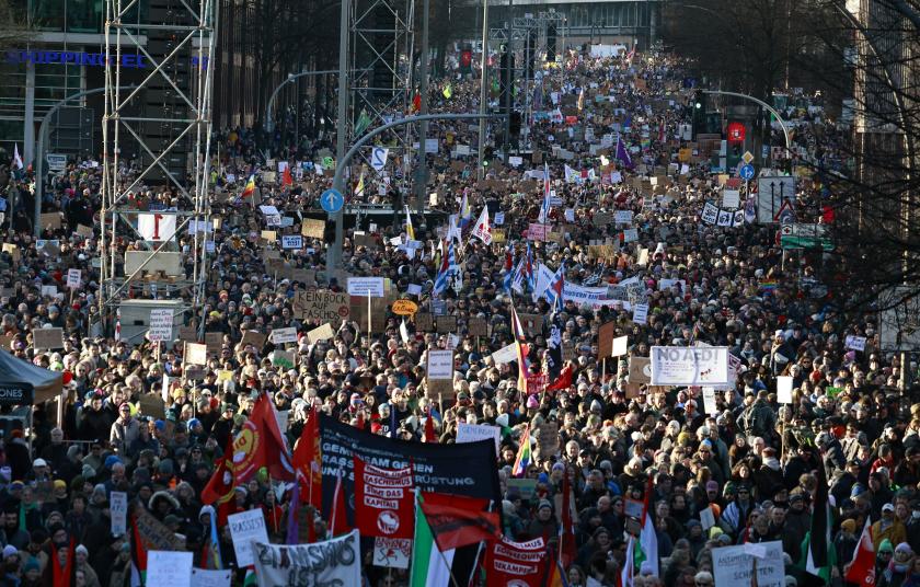 Protesters take part in a demonstration against racism and far-right politics on January 28, 2024 in Hamburg, northern Germany. Over a million people have joined marches in cities from Hamburg to Dresden to Stuttgart in protest at the Alternative for Germany (AfD) party over the last days. The wave of mobilisation was sparked by a January 10, 2024 report by investigative outlet Correctiv, which revealed that AfD members had discussed the expulsion of immigrants and "non-assimilated citizens" at a Potsdam meeting with extremists. MORRIS MAC MATZEN / AFP Protesters take part in a demonstration against racism and far-right politics on January 28, 2024 in Hamburg, northern Germany. Over a million people have joined marches in cities from Hamburg to Dresden to Stuttgart in protest at the Alternative for Germany (AfD) party over the last days. The wave of mobilisation was sparked by a January 10, 2024 report by investigative outlet Correctiv, which revealed that AfD members had discussed the expulsion of immigrants and "non-assimilated citizens" at a Potsdam me