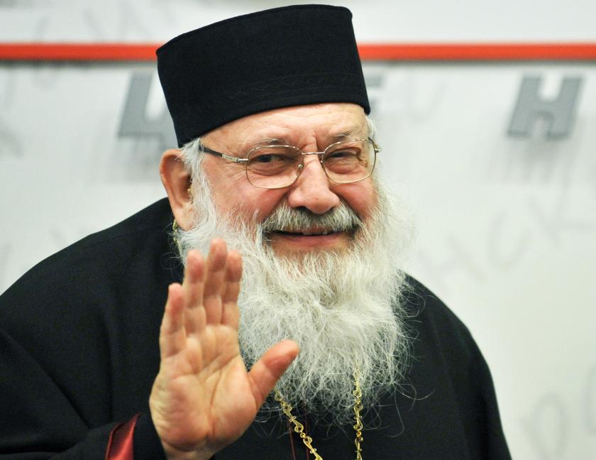 Lubomyr Husar, 77, head of the Ukrainian Greek Catholic Church, the Catholic Major Archbishop of Kiev-Galicia and Cardinal of the Catholic Church, waves his hand as he leaves after a press conference in Kiev on February 10, 2011. Lubomyr Husar declared his resignation by reason of his declining years and problems with the health. AFP PHOTO/ SERGEI SUPINSKY