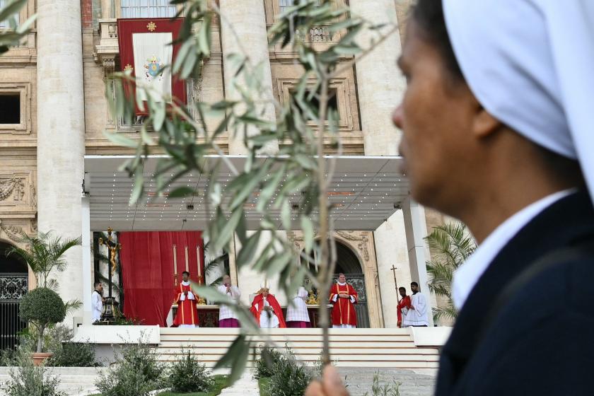 Pope Francis presides the Palm Sunday mass at St Peter's square in the Vatican on March 24, 2024.  Alberto PIZZOLI / AFP