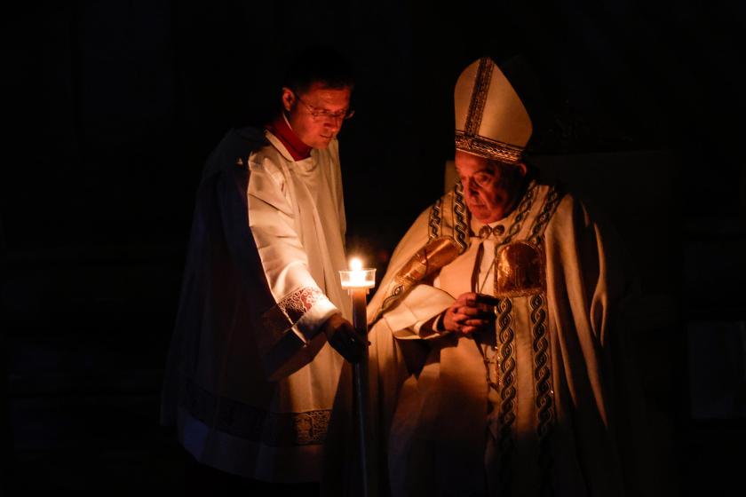 Pope Francis (R) presides over a Holy Mass to Easter Vigil in the Holy Night of Easter at Saint Peter's Basilica in Vatican City, 30 March 2024. EPA/GIUSEPPE LAMI