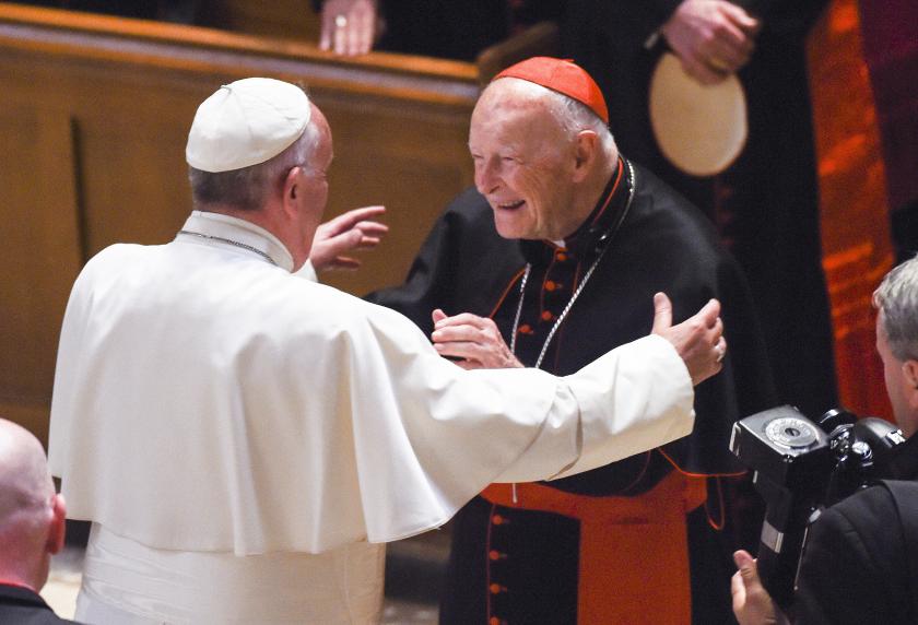 (FILES) Pope Francis reaches out to hug Cardinal Archbishop emeritus Theodore McCarrick after the Midday Prayer of the Divine with more than 300 US Bishops at the Cathedral of St. Matthew the Apostle on September 23, 2015 in Washington, DC. McCarrick, the once-powerful archbishop of Washington, DC, and was found guilty of sexual abuse by the church, died on April 4, 2025, at the age of 94, according to media reports. McCarrick was suspended in 2018, amid accusations he had sexually abused a teenage boy in the 1970s. In 2019, he became the first US cardinal or bishop defrocked by the Vatican. Jonathan Newton / POOL / AFP (FILES) Pope Francis reaches out to hug Cardinal Archbishop emeritus Theodore McCarrick after the Midday Prayer of the Divine with more than 300 US Bishops at the Cathedral of St. Matthew the Apostle on September 23, 2015 in Washington, DC. McCarrick, the once-powerful archbishop of Washington, DC, and was found guilty of sexual abuse by the church, died on April 4, 2025, at the age of 94, according to media reports. McCarrick was suspended in 2018, amid accusations he had sexually abused a teenage boy in t