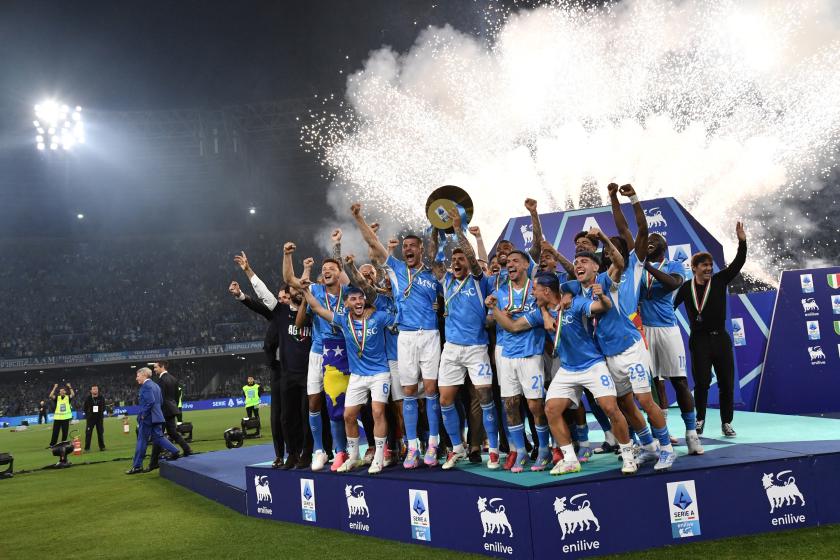 Napoli's Italian defender #22 Giovanni Di Lorenzo lifts the trophy with teammates during a ceremony for the Italian Champions following the Italian Serie A football match between Napoli and Cagliari at the Diego Armando Maradona stadium in Naples on May 23, 2025. Isabella BONOTTO / AFP Napoli's Italian defender #22 Giovanni Di Lorenzo lifts the trophy with teammates during a ceremony for the Italian Champions following the Italian Serie A football match between Napoli and Cagliari at the Diego Armando Maradona stadium in Naples on May 23, 2025. Isabella BONOTTO / AFP