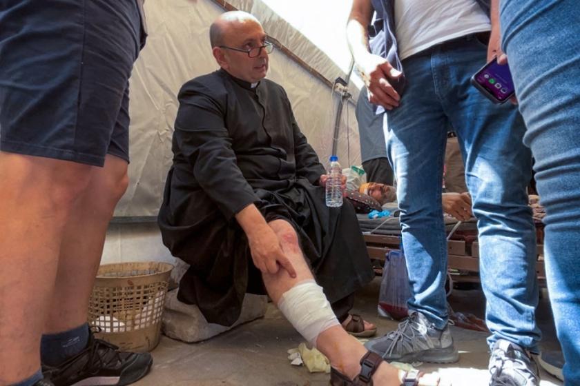 Parish Priest of the Holy Family church in Gaza City Fr. Gabriel Romanelli receives care after he was injured in an Israeli strike on the church, at the city's Arab Ahli, also known as Baptist, hospital on July 17, 2025. The Latin Patriarchate of Jerusalem said an Israeli strike on Gaza's only Catholic church injured several people on July 17, including the parish priest, as well as causing damage to the building. Omar AL-QATTAA / AFP Parish Priest of the Holy Family church in Gaza City Fr. Gabriel Romanelli receives care after he was injured in an Israeli strike on the church, at the city's Arab Ahli, also known as Baptist, hospital on July 17, 2025. The Latin Patriarchate of Jerusalem said an Israeli strike on Gaza's only Catholic church injured several people on July 17, including the parish priest, as well as causing damage to the building. Omar AL-QATTAA / AFP