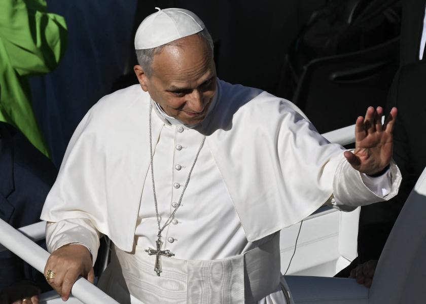 Pope Leo XIV waves to pilgrims as he tours in the Popemobile after celebrating the Jubilee Mass for Consacrated life at the Vatican on October 09, 2025 Filippo MONTEFORTE / AFP