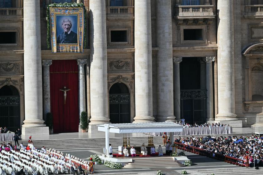 A portrait of Saint John Henry Newman is hanged on St Peter's basilica during the Solemnity of All Saints with the Rite of Proclamation of Saint John Henry Newman as a "Doctor of the Church" on the occasion of the Jubilee of the World Education on All Saints' Day at St. Peter's square, in The Vatican on November 1, 2025. Andreas SOLARO / AFP