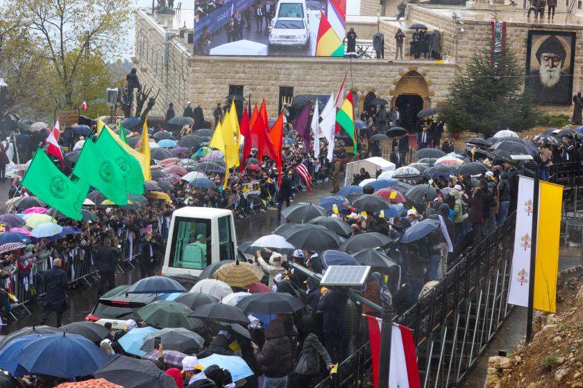 Pope Leo XIV arrives in the popemobile at the tomb of Saint Charbel Makhlouf in Annaya, north of Beirut on December 1, 2025. Pope Leo XIV is set to urge peace and unity on his second day in Lebanon on December 1, 2025, bringing a message of hope to young people whose faith in their crisis-hit country has dwindled. AFP