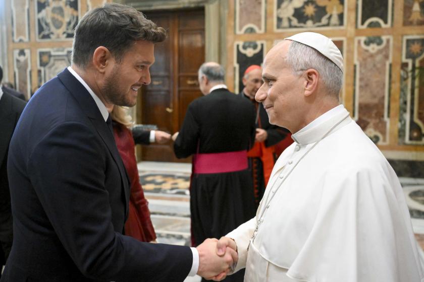 A handout picture provided by the Vatican Media shows Pope Leo XIV greeting singer Michael Buble during a meeting with artists and organizers on the eve of the annual Christmas Vatican 'Concert with the Poor' at its sixth edition, in Vatican City, 05 December 2025.