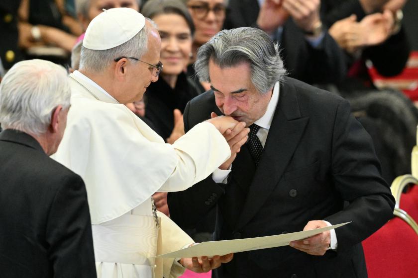 Conductor Riccardo Muti poses next to Pope Leo XIV as he receives the Ratzinger Prize 2025 during a Christmas concert, at Paul-VI audience hall in The Vatican on December 12, 2025. Tiziana FABI / AFP