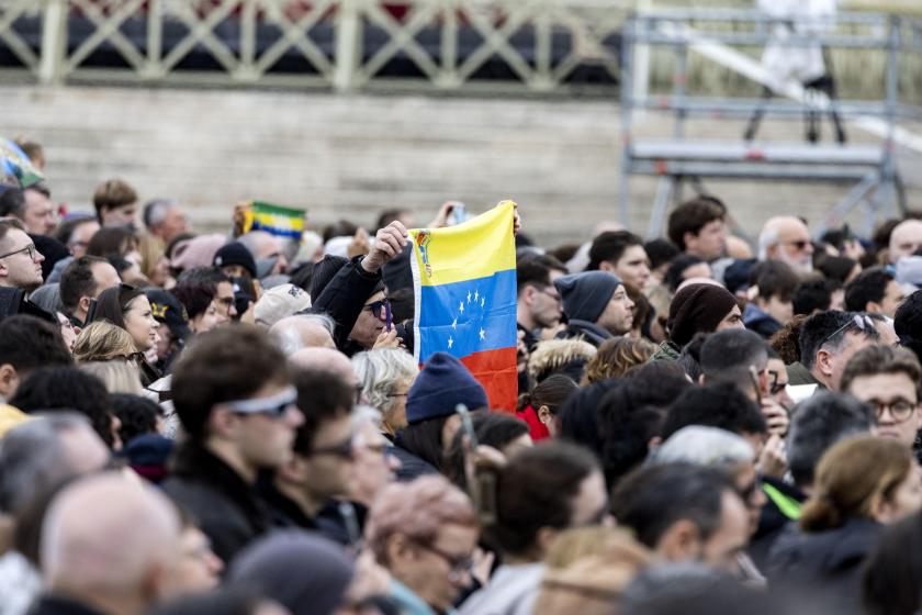  A Venezuelan flag is waved in Saint Peter's square during Pope Leo XIV's Sunday Angelus prayer in Vatican City, 04 January 2026. EPA/MASSIMO PERCOSSI