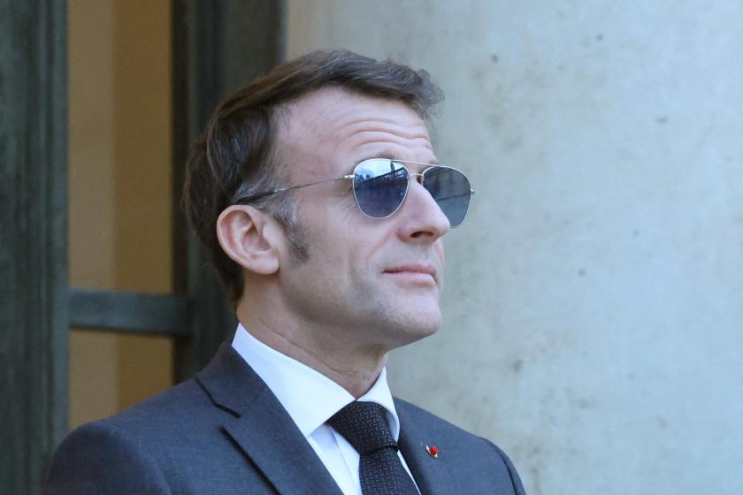 France's President Emmanuel Macron wearing sunglasses reacts as he waits for Lebanon's Prime Minister's arrival prior to their meeting at the Elysee presidential palace in Paris, on January 23, 2026. Ludovic MARIN / AFP