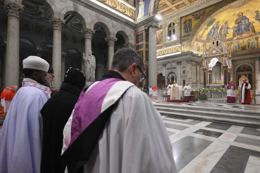  A handout picture provided by the Vatican Media shows Pope Leo XIV (C) during the Vespers on the Feast of the Conversion of St. Paul the Apostle at St. Paul Outside the Walls Basilica in Rome, Italy, 25 January 2026