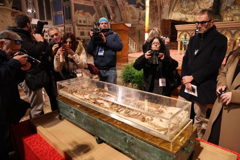 The body of St. Francis of Assisi is displayed to the public for the first time in history in a glass shrine in front of the altar of the Lower Basilica in Assisi, Italy, 21 February 2026. EPA/Gianluigi Basilietti