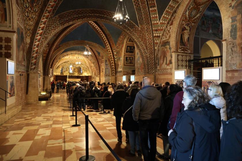 Fithful attend a holy mass inside the Basilica Inferiore of Assisi, which houses the body of St. Francis displayed to the public for the first time in history, in Assisi, Italy, 22 February 2026. EPA/GIANLUIGI BASILIETTI