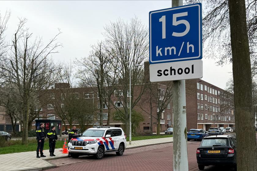A photograph taken on March 14, 2026 shows a police car parked outside a Jewish school, in Amsterdam, where an explosion was reported overnight. An overnight blast against an exterior wall of a Jewish school in Amsterdam did not cause any injuries, Mayor Femke Halsema said on March 14, denouncing "a cowardly act of aggression". An investigation has been opened and the incident comes after nighttime attacks this week in front of synagogues in the Belgian city of Liege and the Dutch port city of Rotterdam. St