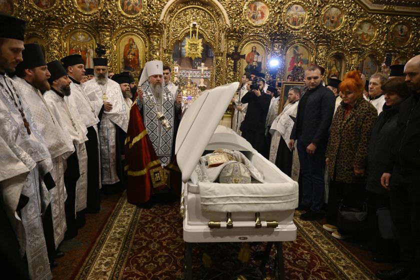 Metropolitan Epiphanius (C), head of the Orthodox Church of Ukraine, conducts a religious service for the late Patriarch Filaret in St. Michael’s Golden-Domed Cathedral in Kyiv on March 20, 2026, amid the Russian invasion of Ukraine. Patriarch Filaret was a central player in establishing an independent Ukrainian Church in the 1990s, breaking from the Russian Church, which has become increasingly entwined with the Kremlin and supports Russia's war on Ukraine.  Genya SAVILOV / AFP
