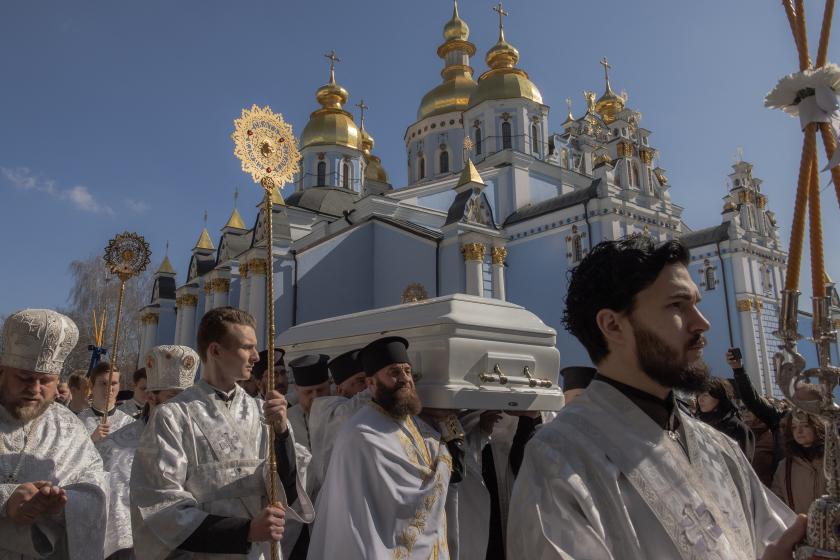 Clergy carry the coffin of the late Patriarch Filaret during a funeral procession at St. Michael’s Golden-Domed Monastery in Kyiv on March 22, 2026, amid the Russian invasion of Ukraine. The Patriarch was a central player in establishing an independent Ukrainian Church in the 1990s, breaking from the Russian Church, which has become increasingly entwined with the Kremlin supporting Russia's war on Ukraine. Roman PILIPEY / AFP