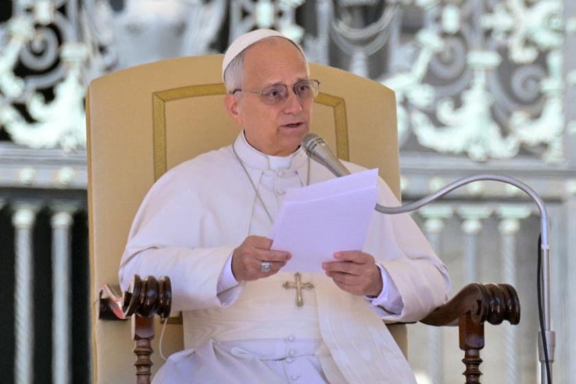 Pope Leo XIV addresses the crowd during the weekly general audience at St Peter's Square in The Vatican on April 8, 2026. Tiziana FABI / AFP