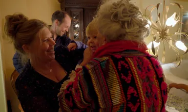 Vrouw met kind op arm